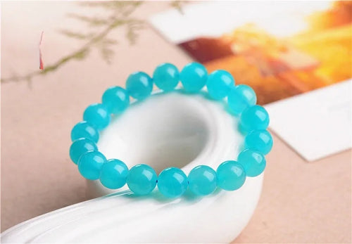 7A grade Amazonite natural stone scattered beads in various sizes from 6mm to 13mm with polished surfaces