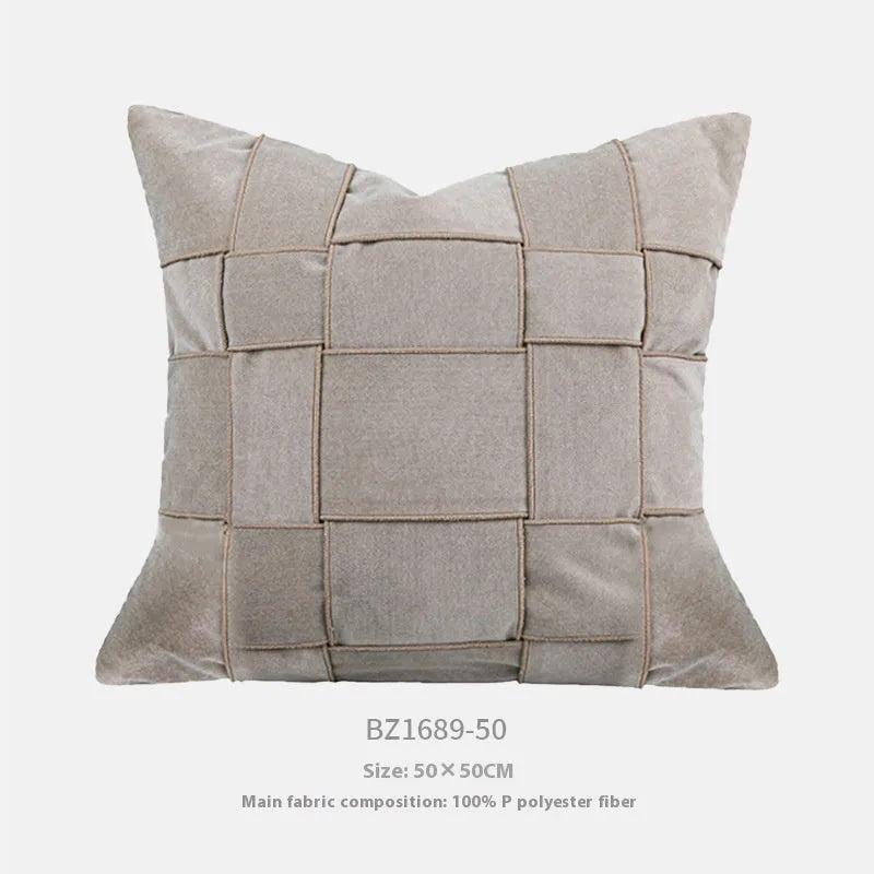 Square chenille woven cushion in beige colour showing textured surface