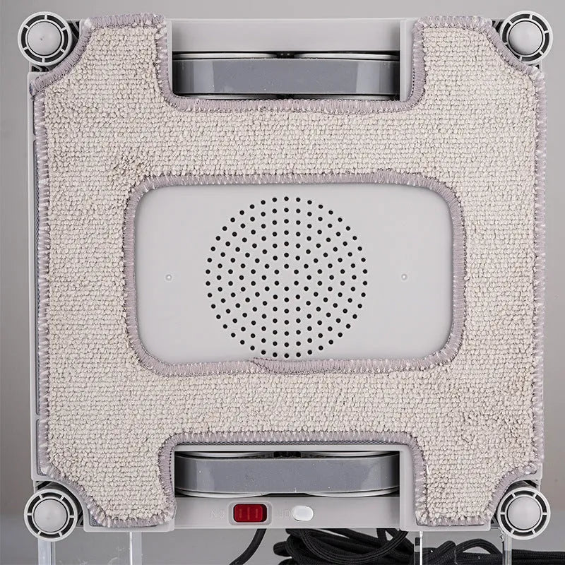 White high-rise window cleaning robot with water spray functionality