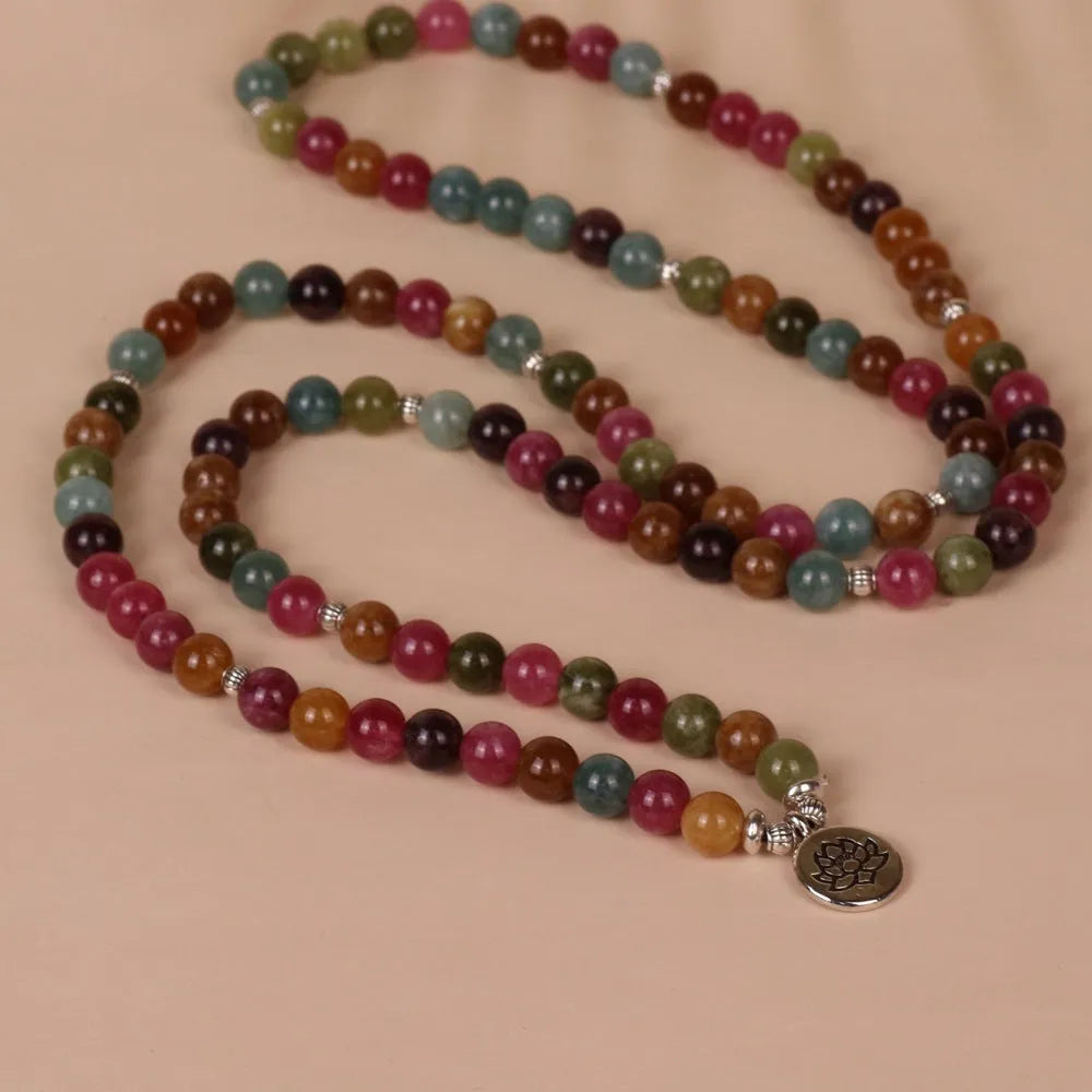 108-bead alloy bracelet with a multi-layer lotus charm in a natural tourmaline colour.