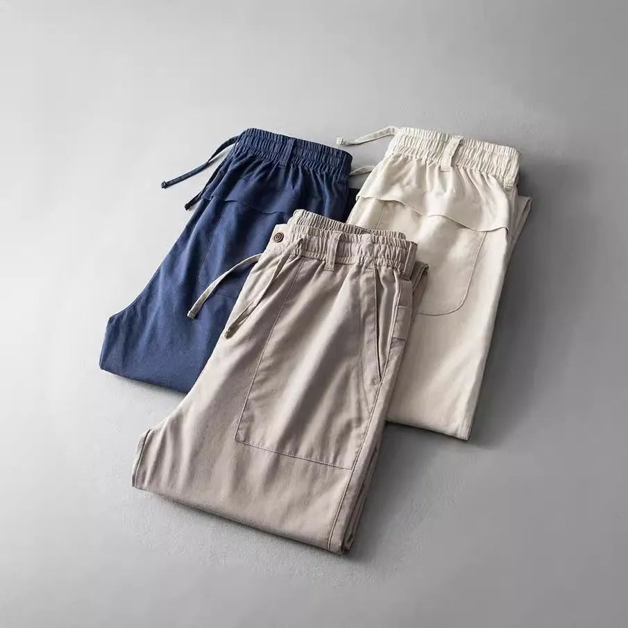 Men's linen casual trousers in solid colours showing mid waist design and trousers length
