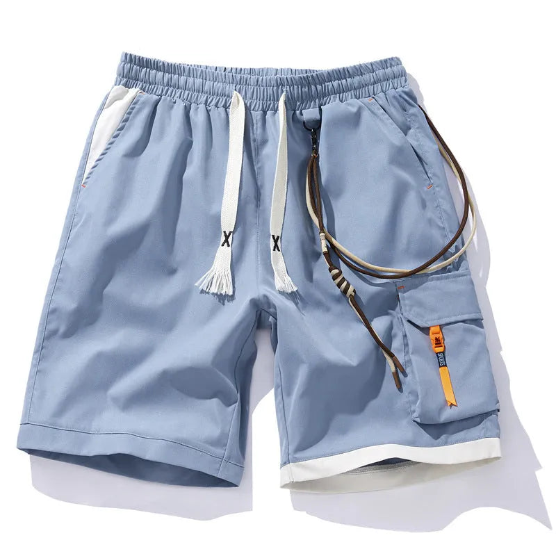 Man wearing coffee-coloured loose-fit bamboo fibre plus size sports shorts with a high waist.