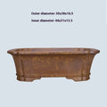 Purple sand rectangular flowerpot showing textured segment mud construction and geometric angles.