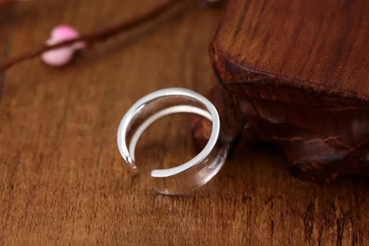 Geometric adjustable open ring with frosted silver electroplated finish