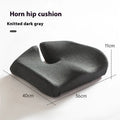 Dark grey memory foam office chair cushion measuring 36x40cm on a desk chair.