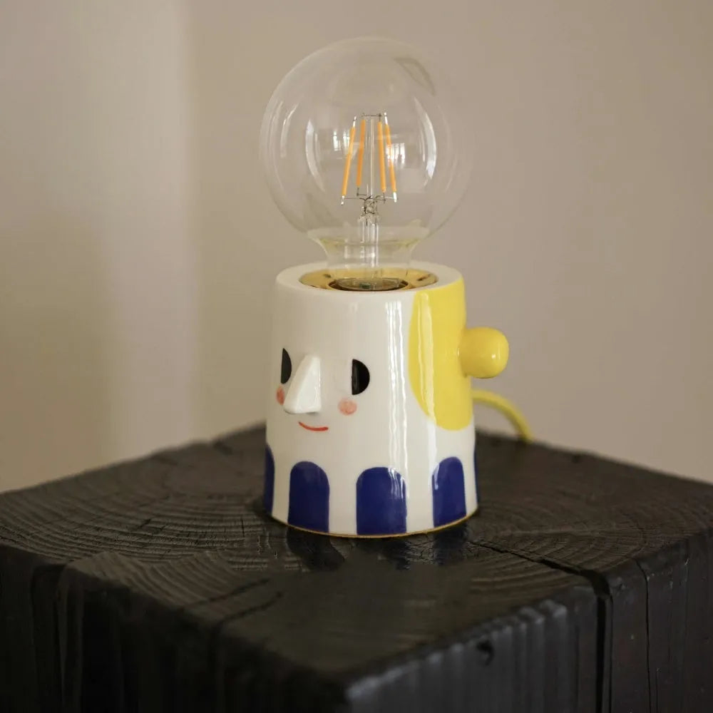 Handmade ceramic bedside lamp with ball headlight decorative design