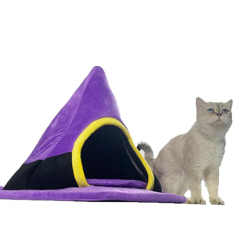 Purple witch hat shaped cat bed measuring 60 by 45 centimetres