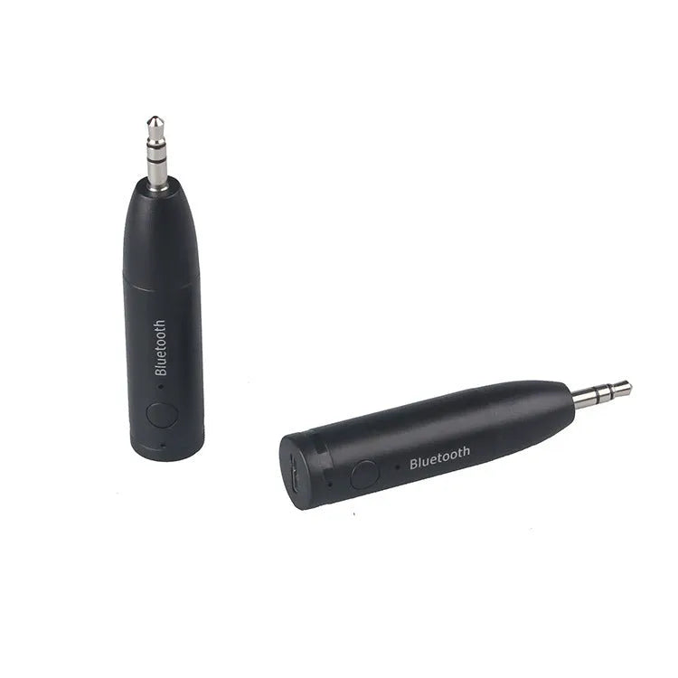 Black Bluetooth audio receiver with 3.5mm jack and USB charging port for car stereo connection