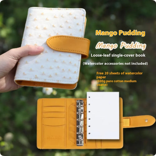A7 loose-leaf watercolour notebook with twin-wire binding shown in avocado green colour