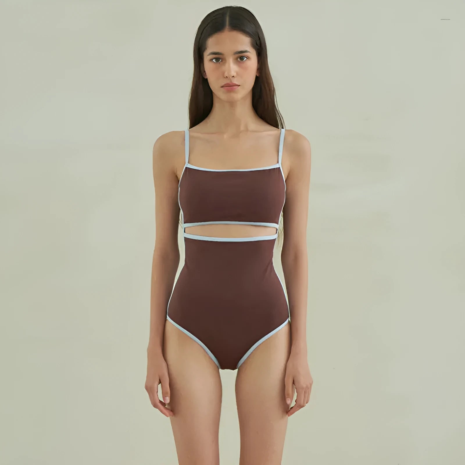 Brown women's one-piece swimsuit with triangle top design and sexy pattern