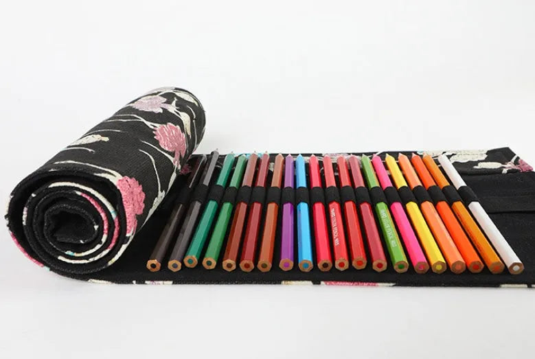 Canvas rolling pencil case with ballet girl print, shown open to display multiple pencil holes.