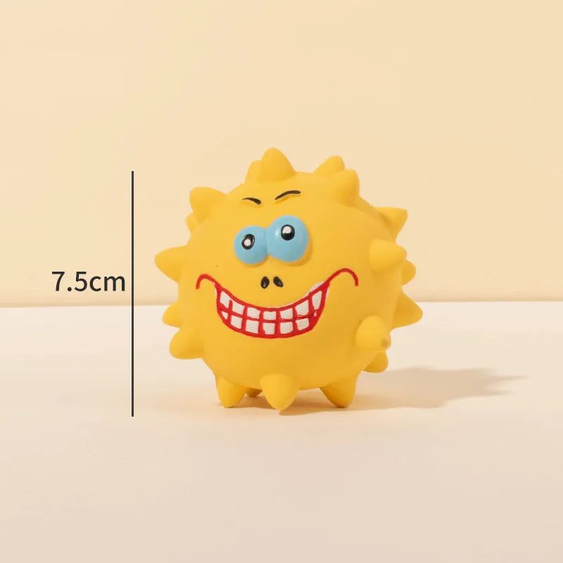 Set of four coloured squeaky dog balls with animal faces and bumpy texture