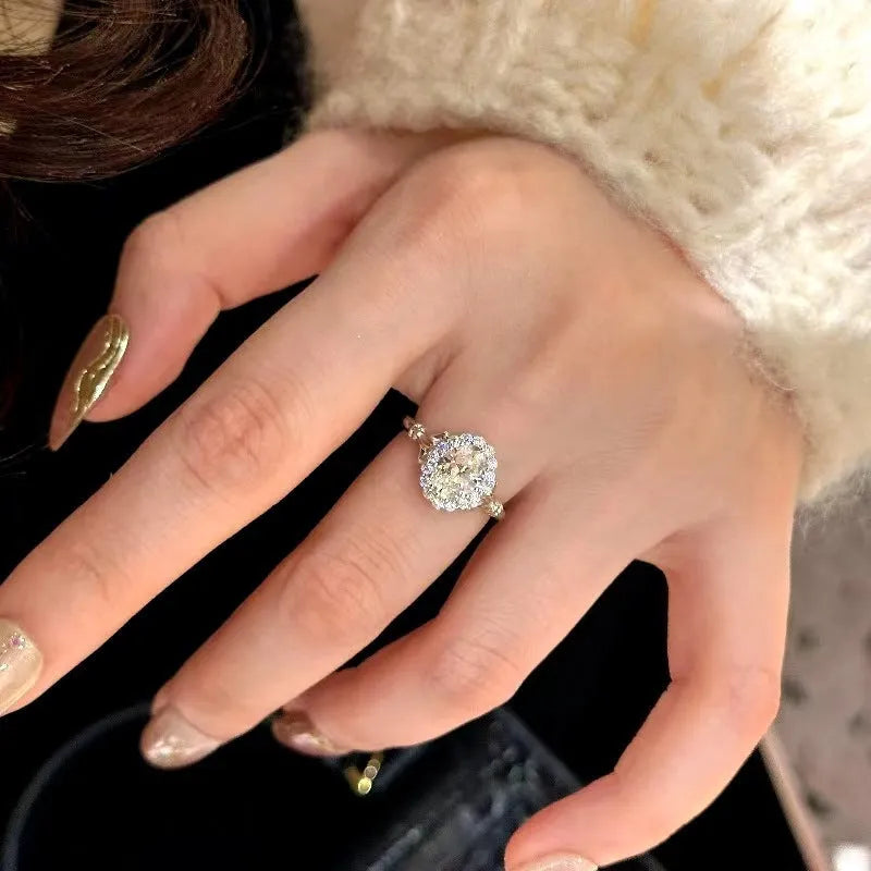 Silver geometric ring with bridal bouquet diamond design and adjustable opening