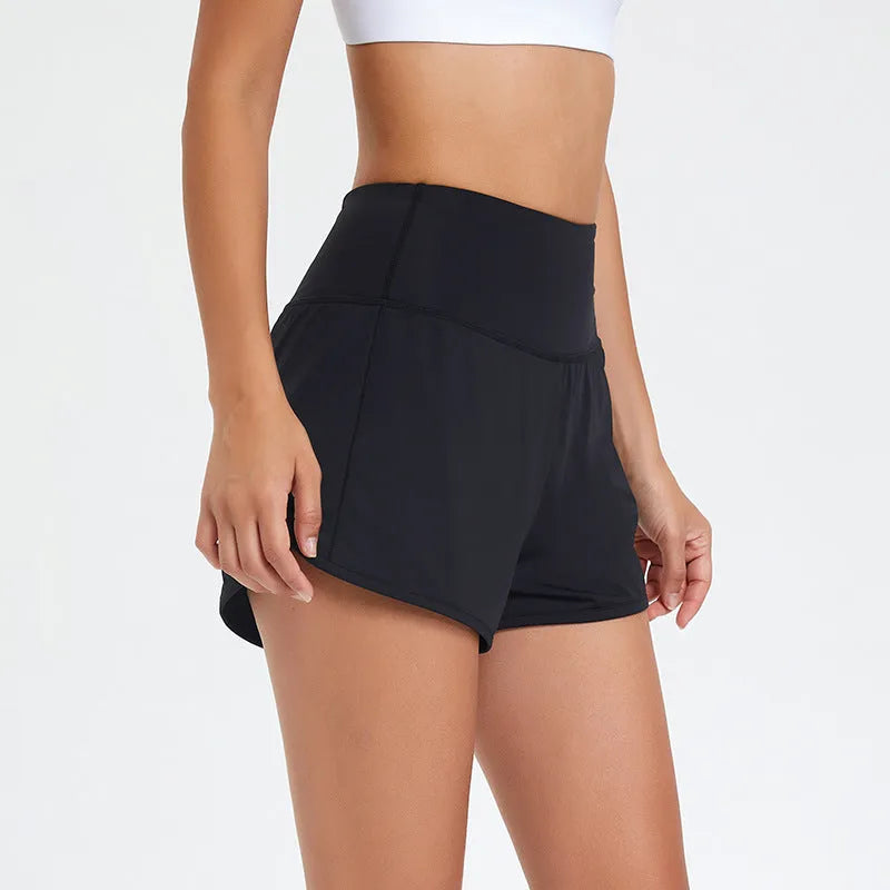 Women's nylon fitness shorts in high-waist design, quick-dry fabric, black/water blue/white colours