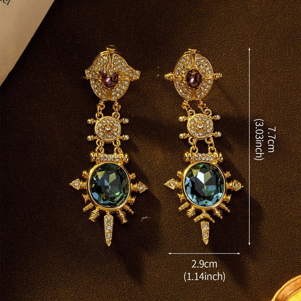 Geometric court style retro stud earrings with gold finish and round elements