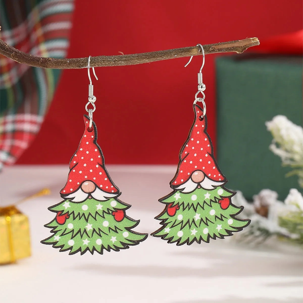 Wooden Christmas earrings with geometric shapes and printed Santa Claus holiday designs
