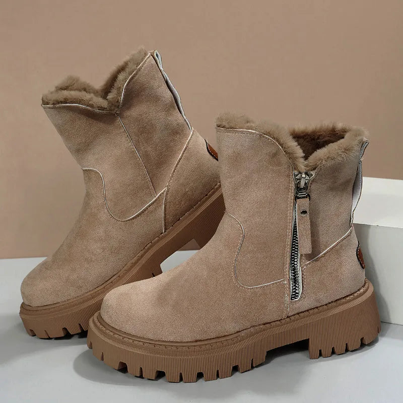 Women's black faux suede high-top snow boots with thick plush lining and a side zipper