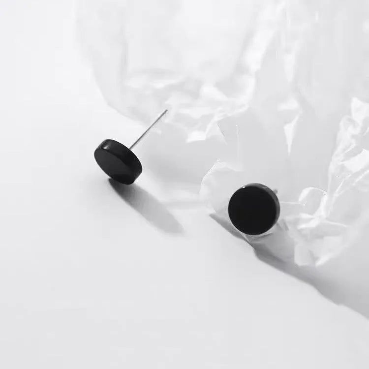 S999 sterling silver flat bone stud earrings in geometric round design