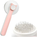 Blue self-cleaning cat and dog grooming brush with rubber handle on a white background.