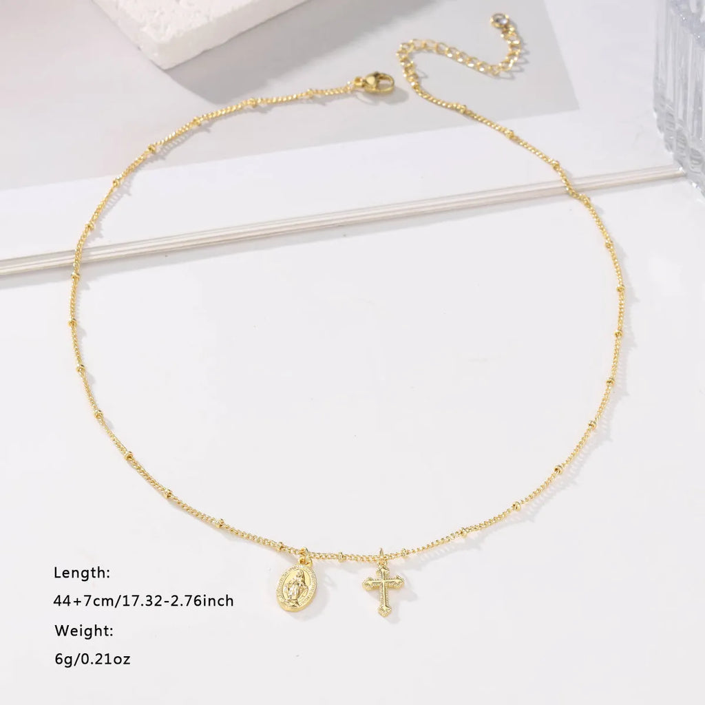 Gold geometric cross Virgin Mary necklace pendant on chain for women's religious jewellery