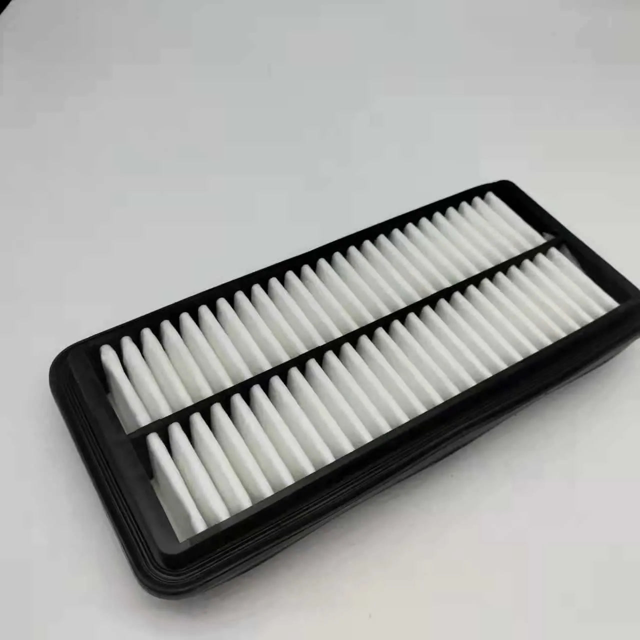 Black rectangular car engine air filter with dimensions 256mm by 113mm by 40mm.