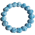 Blue Maillard style bodhi bracelet with natural crystal, sea-pattern stone, and a pearl bead.