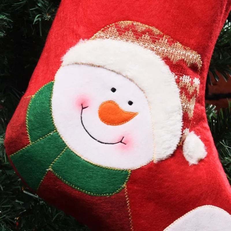 Christmas candy bag non-woven fabric decoration with elk, elderly man, or snowman design for holding stockings.