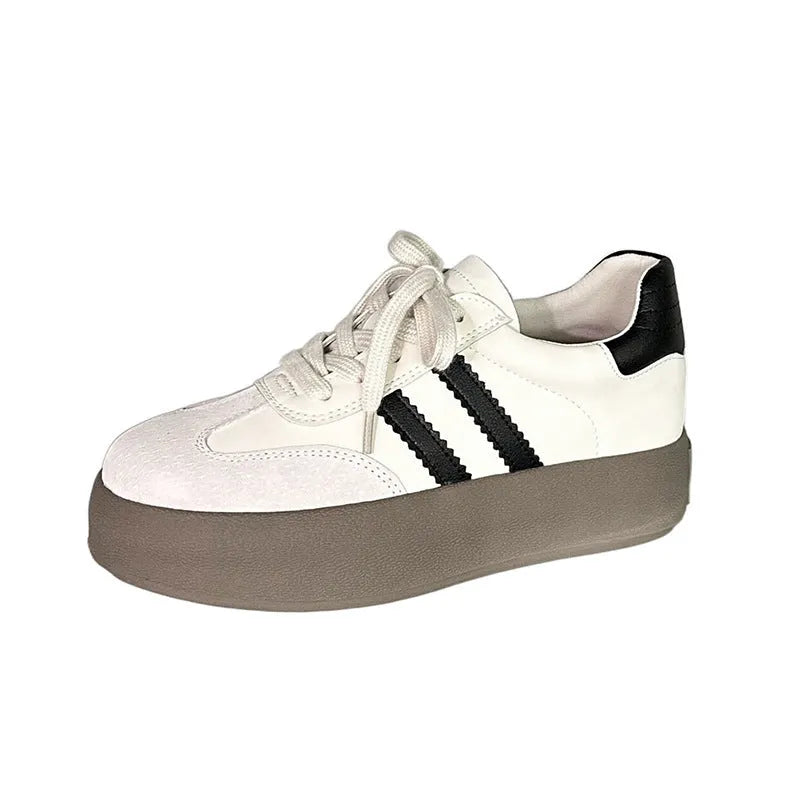Women's vintage distressed leather sneakers with round toe and front lace-up design