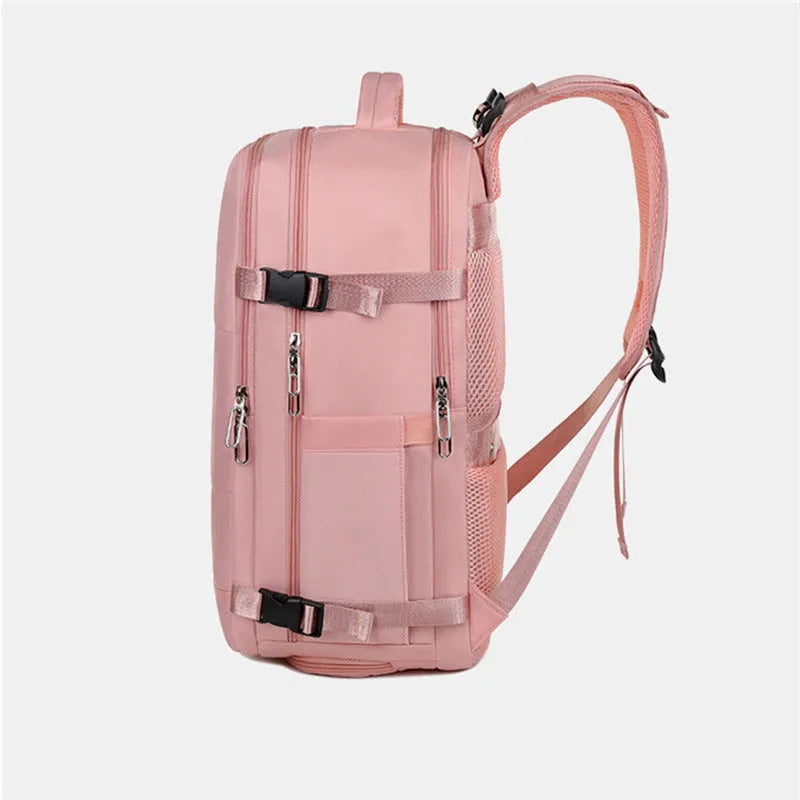 Large purple travel backpack with multiple compartments shown open to reveal organisational pockets