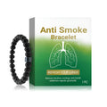 Men's smoke prevention bracelet made of glass and black gallstone beads on a wrist.