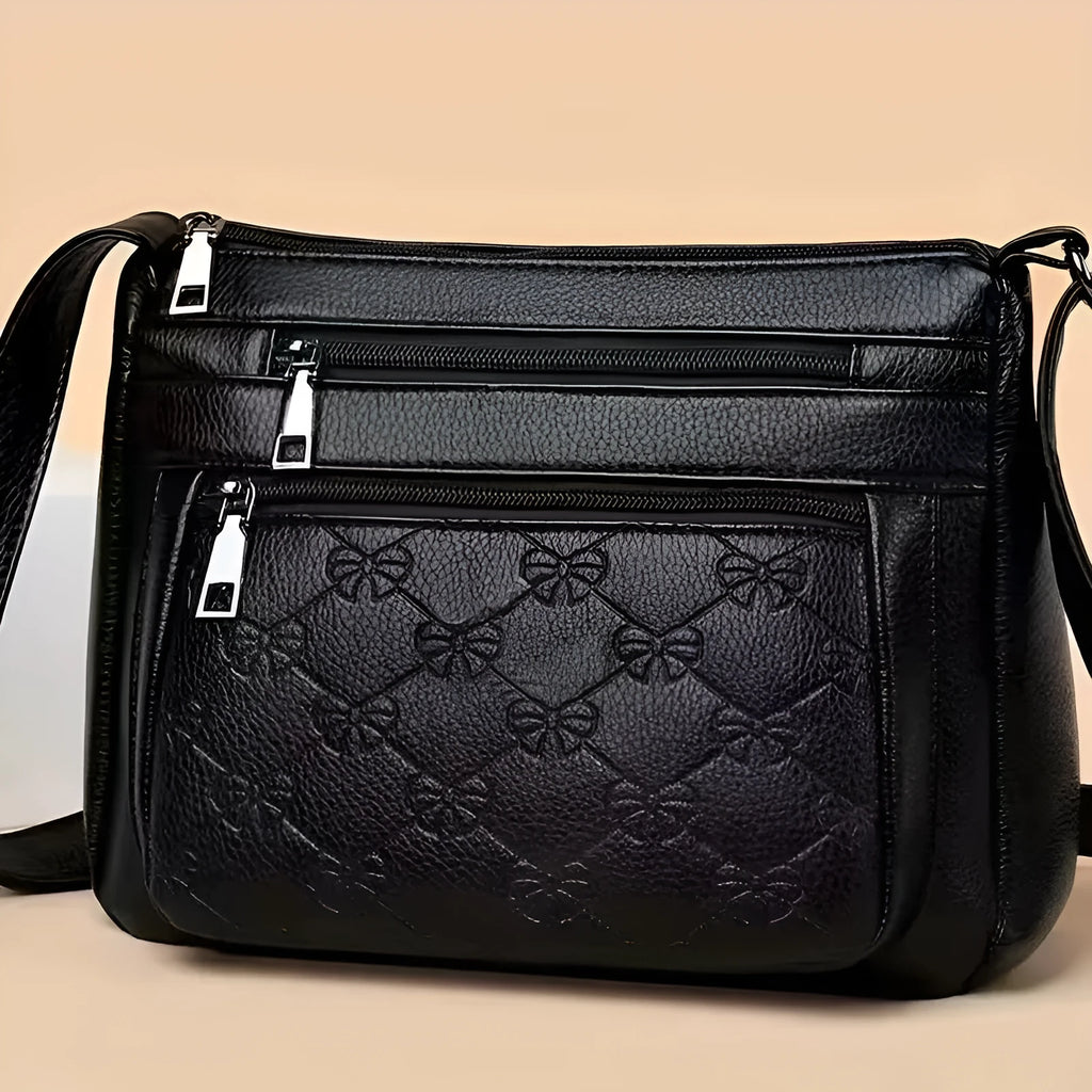 Butterfly black women's shoulder messenger bag with horizontal square shape and crossbody strap