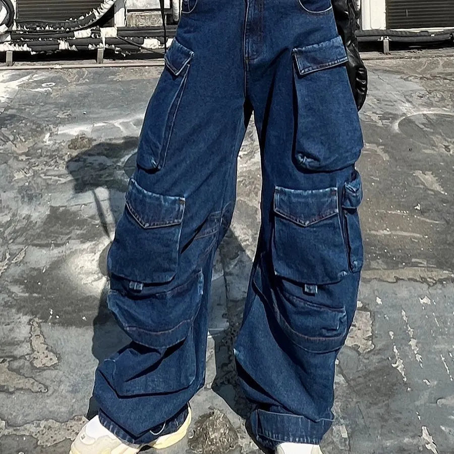 Dark blue distressed wide-leg high waist women's jeans with multiple pockets.