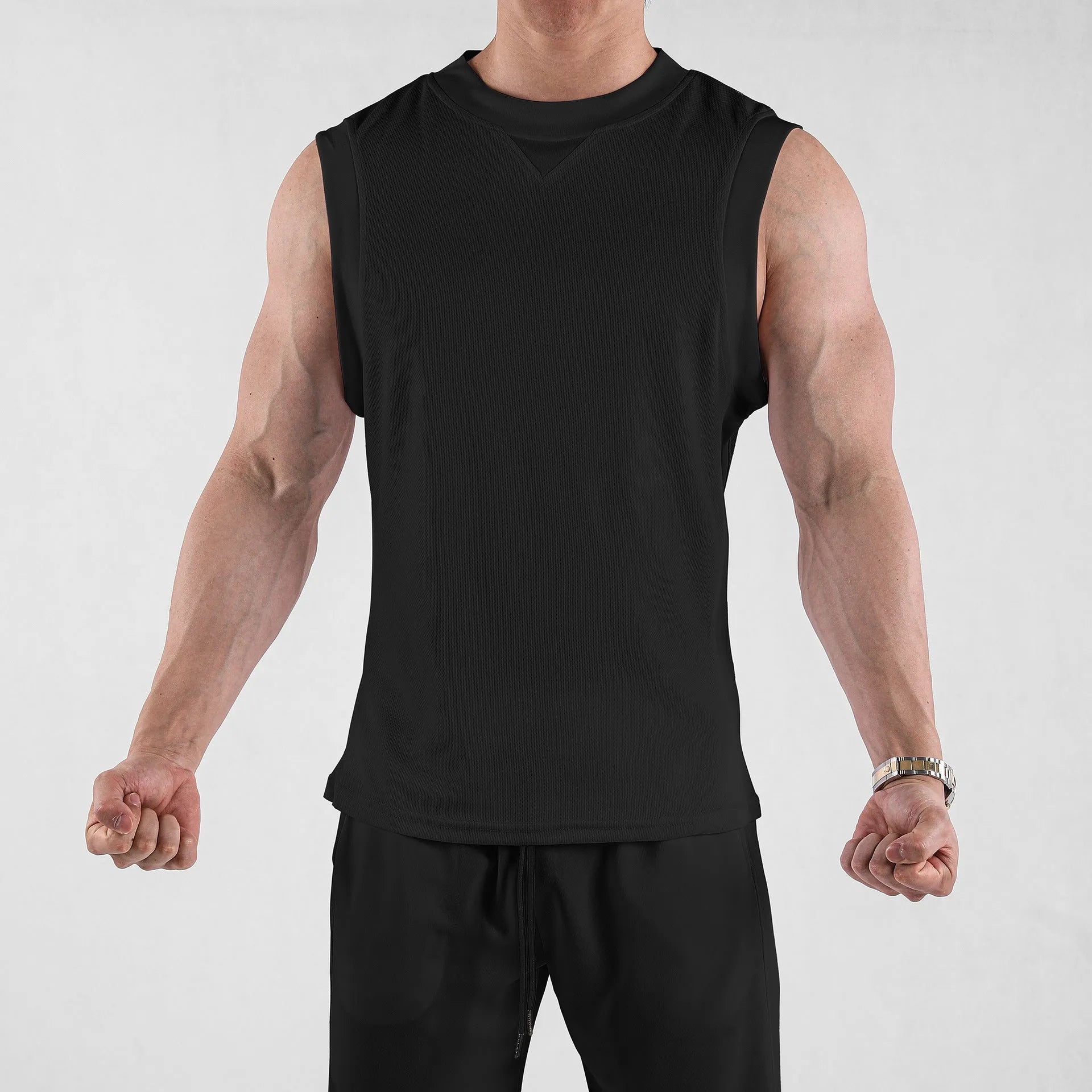 Men's loose-fit sports vest in black polyester fabric for summer fitness activities