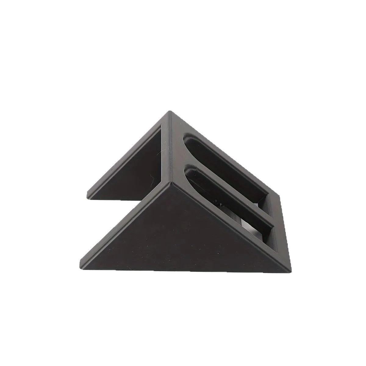 Black punk-style plastic stand for displaying a toy pistol.
