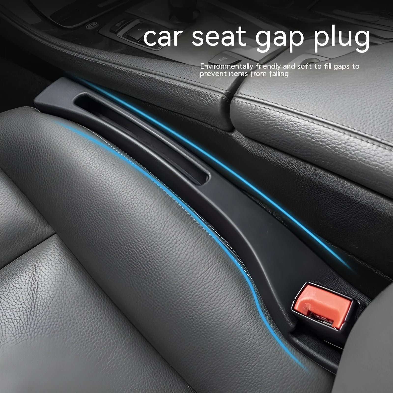 Black plastic car seat gap storage box with removal handle inserted between vehicle seats