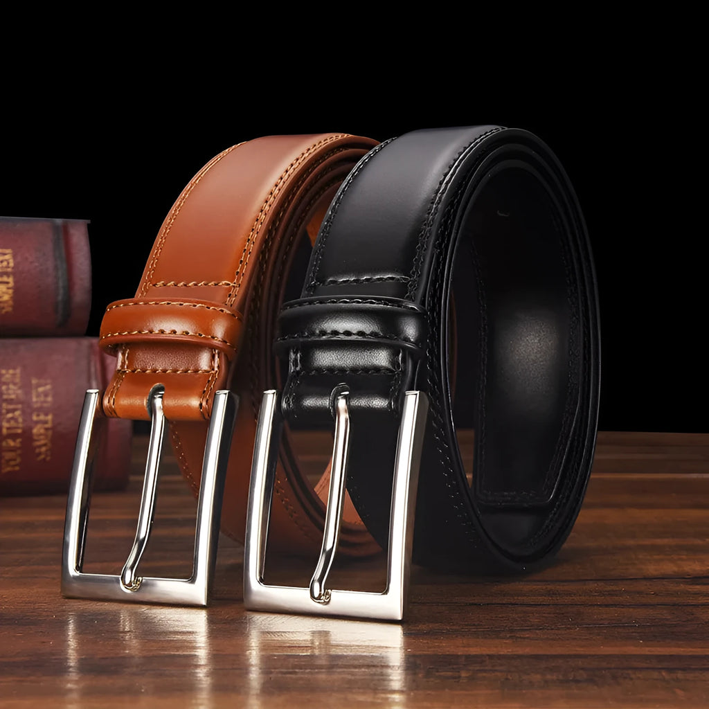 Men's black leather belt with a silver alloy pin buckle, showing the patent leather finish.