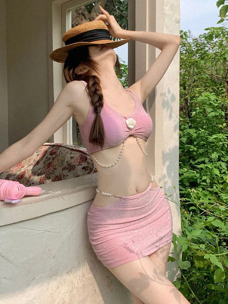 Bear Vacation pink and black three-piece polyester bikini set for women.