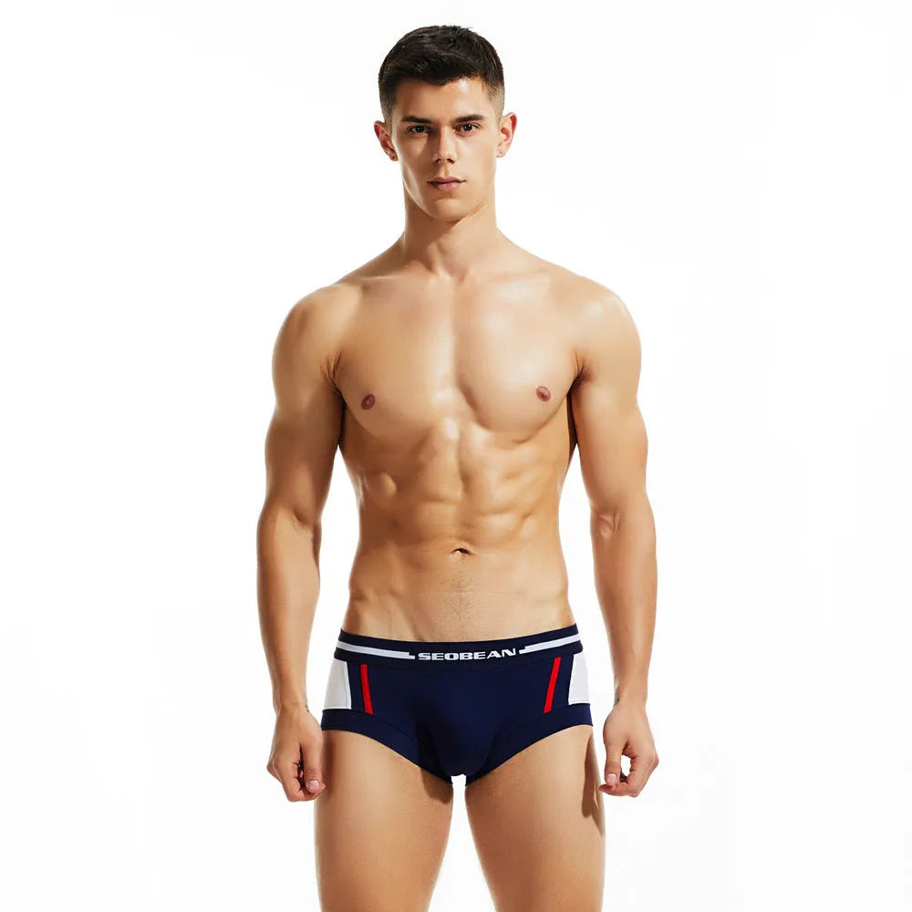 Men's cotton low-waist boxer shorts in red, dark blue, and light grey colours.