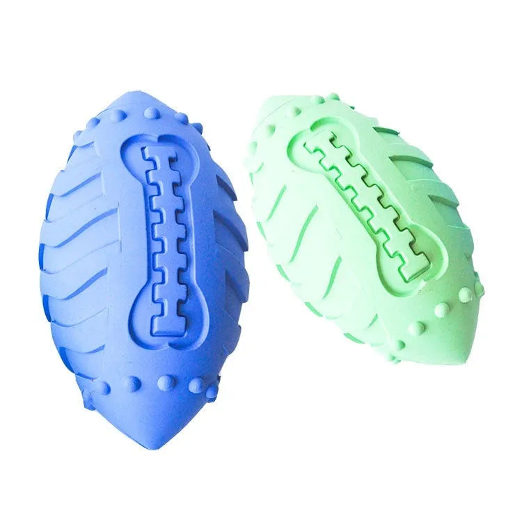 Thick rubber rugby ball dog toy in light green or sapphire blue with vocal sound feature
