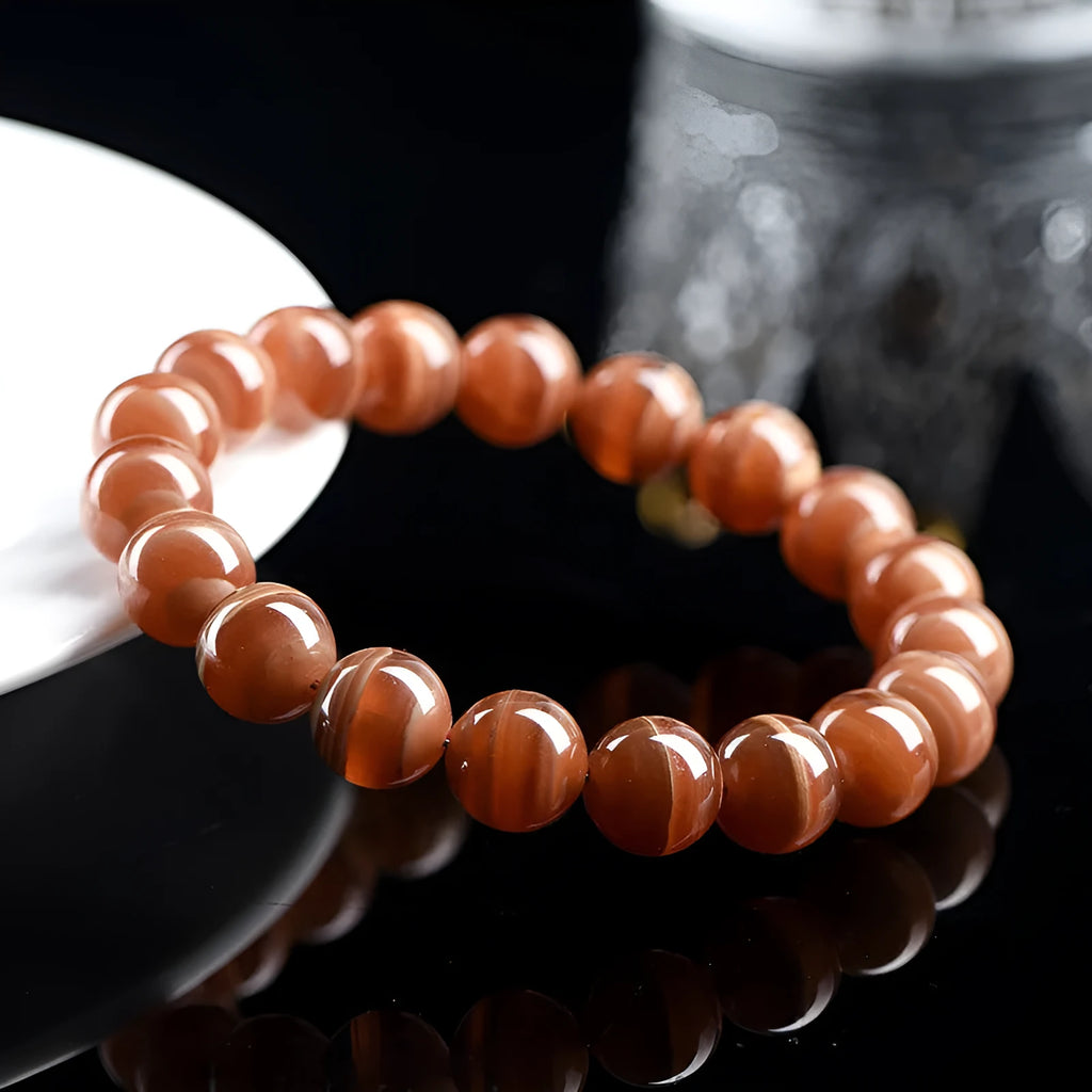 Natural Peruvian rhodochrosite bracelet with round beads in old mine manganese spar colour