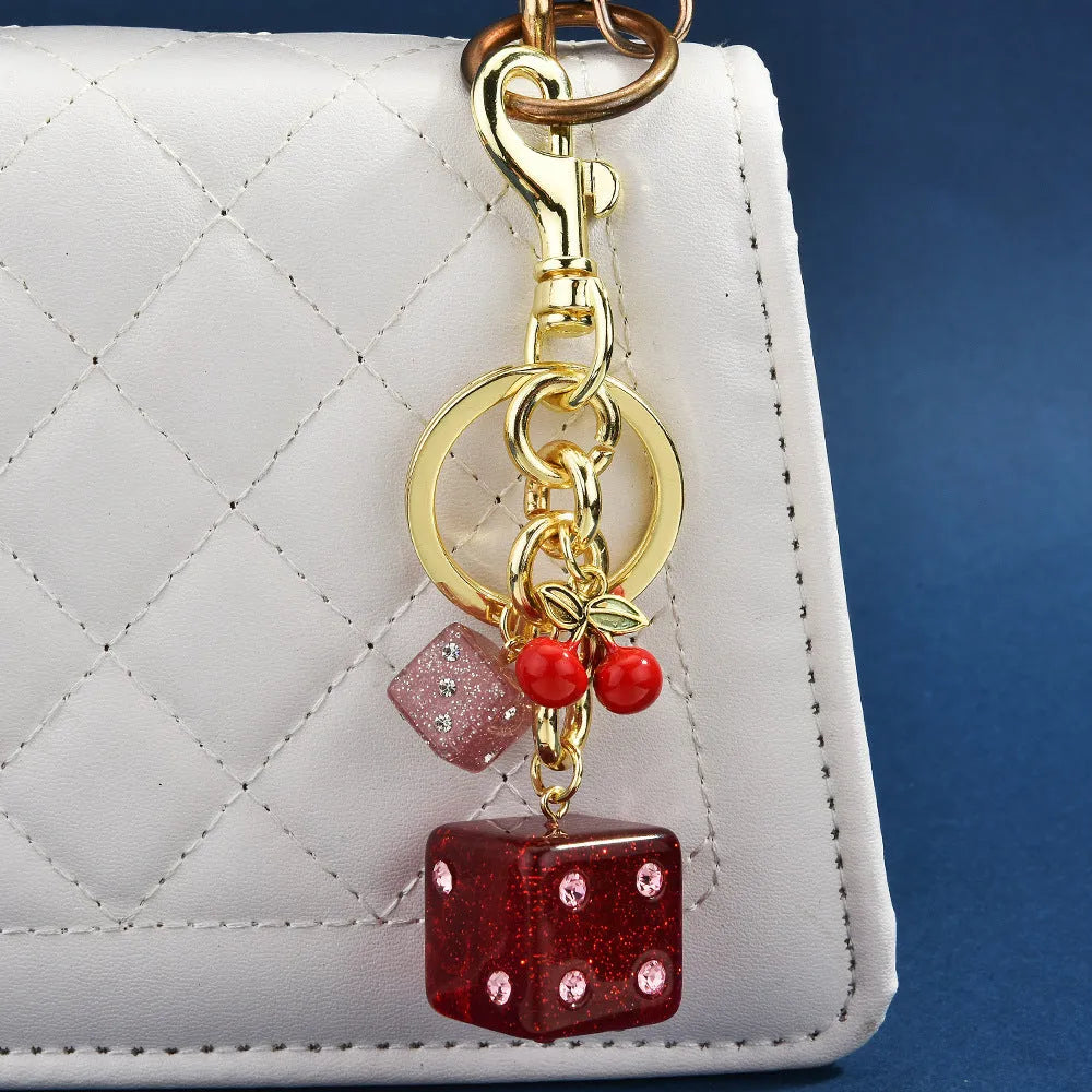 Square metal dice keychain pendant with cherry two-tone electroplated finish