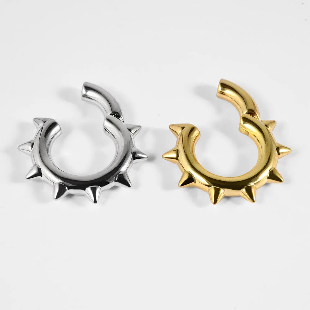 Copper magnetic ear extender jewellery with geometric sharp cone design on ear