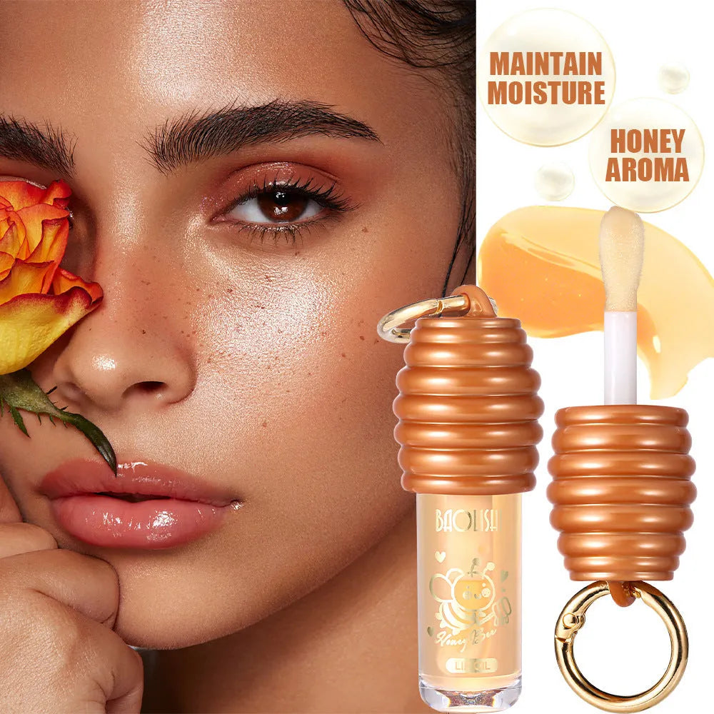 Honey lip gloss with keychain attachment for portable lip moisturising