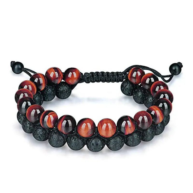 Matte black agate tiger eye bead couple bracelets with geometric design on a neutral background.