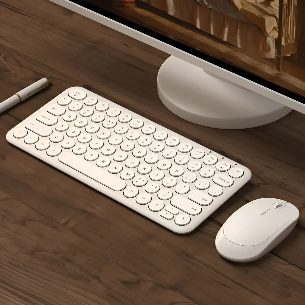 Ultra-thin wireless keyboard and mouse set in black colour on desk