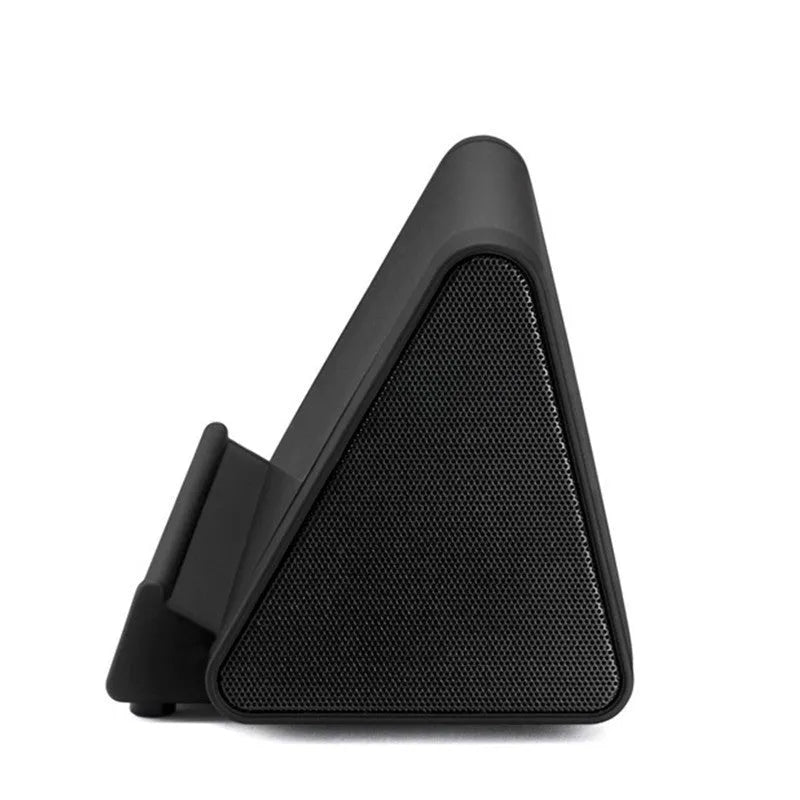 Wireless Bluetooth mini speakers in black or white colours with charging cable