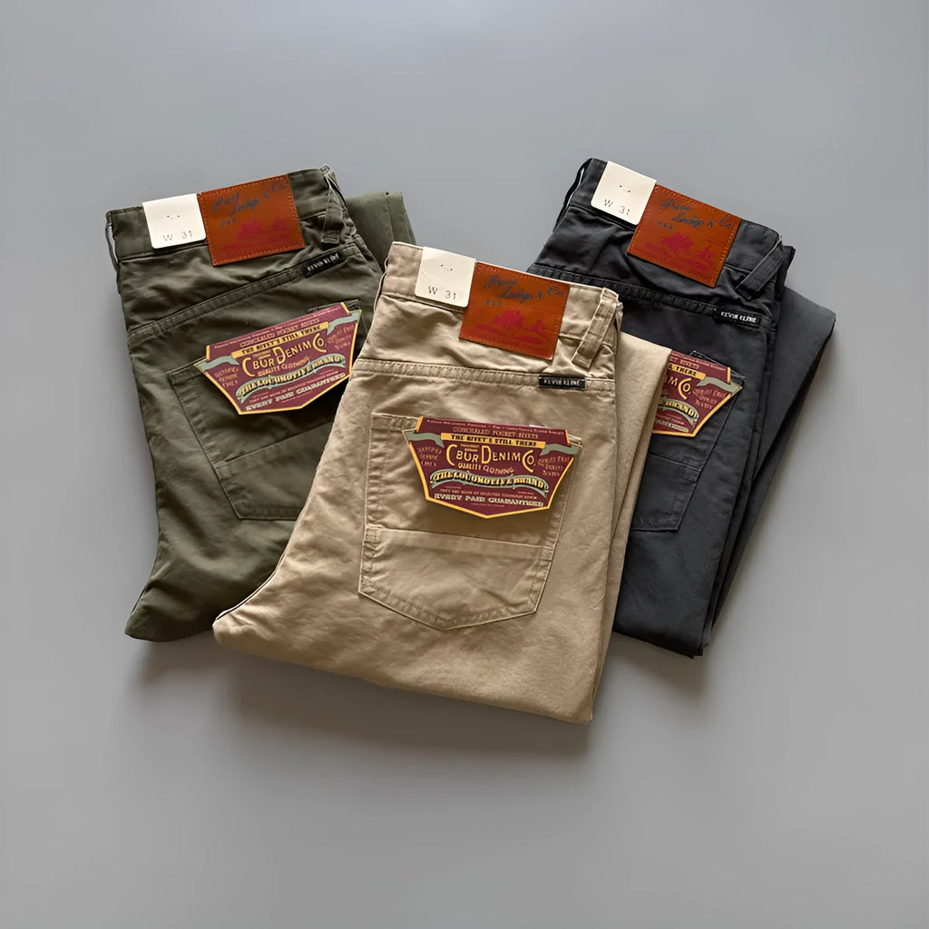 Men's straight-leg casual cotton trousers in army green colour on a mid-waist fit model.