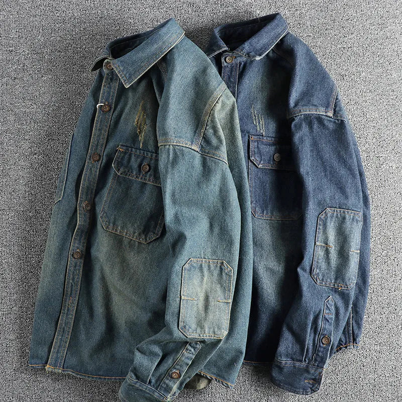 Man wearing a light blue loose-fit vintage denim shirt with long sleeves in a cardigan style.