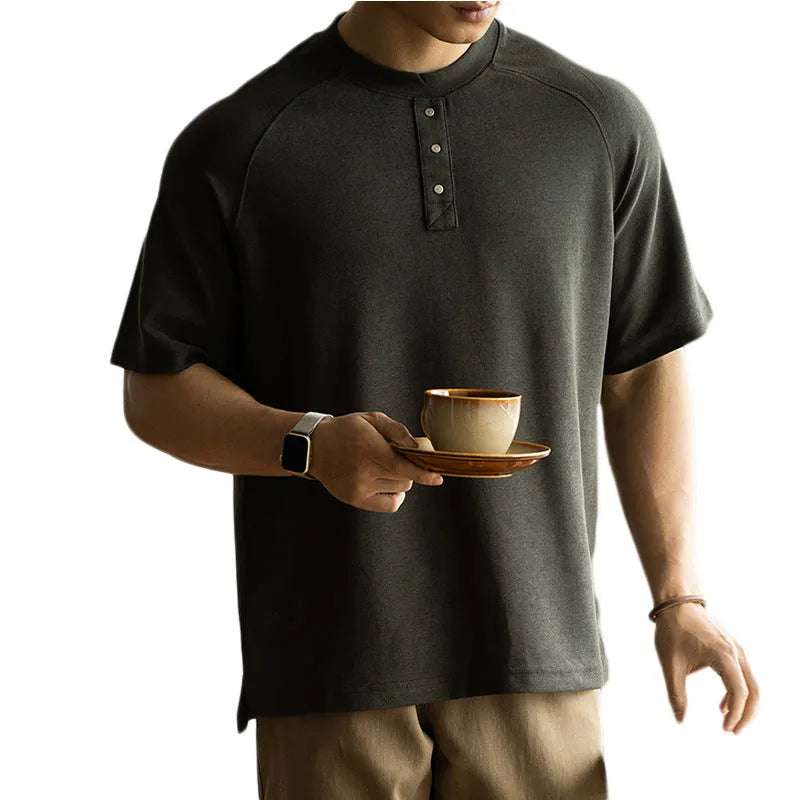 Women's loose-fitting casual pullover top with raglan sleeves in a terry texture fabric.