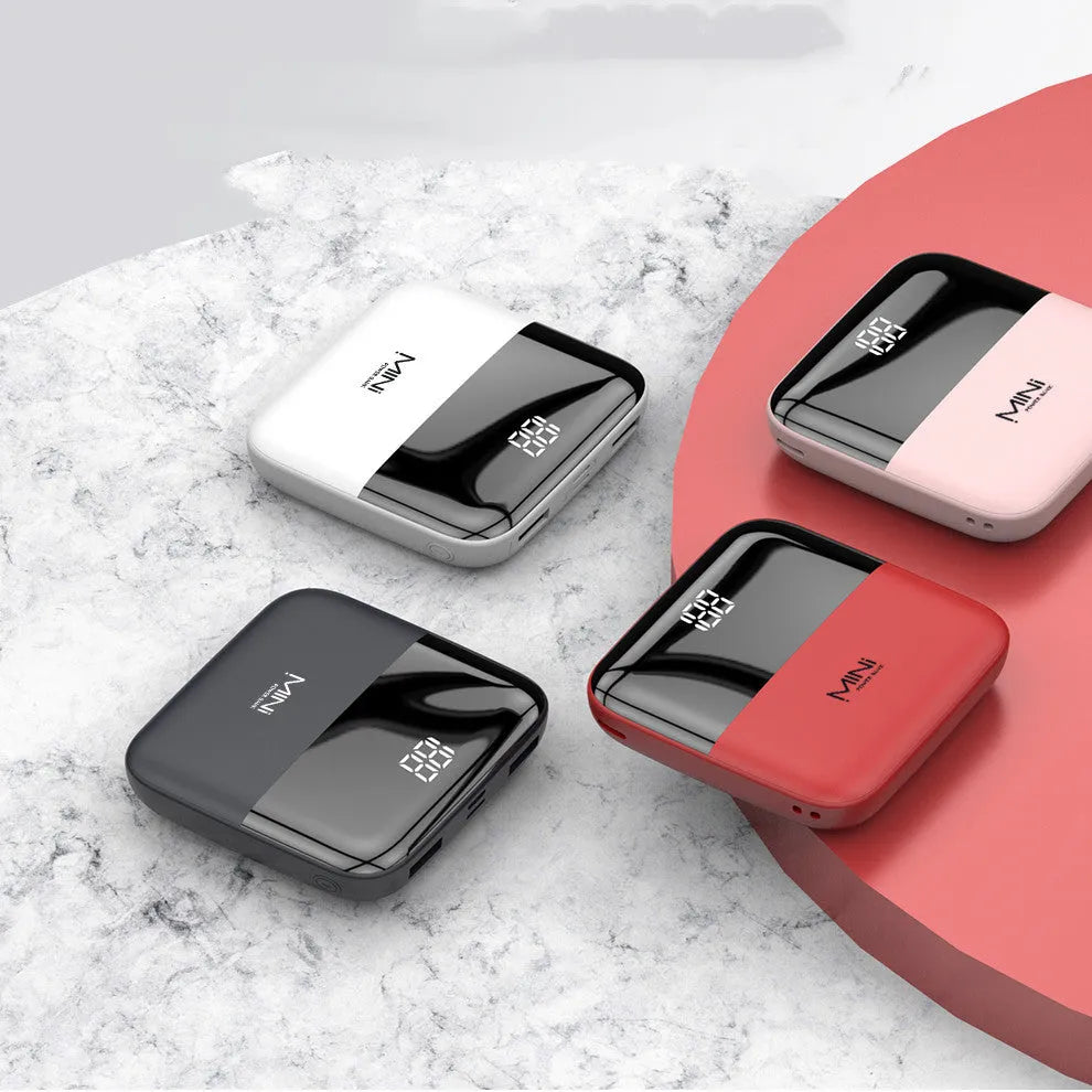 Android portable power bank with digital display showing battery percentage